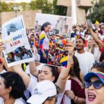 Manifestantes durante una protesta en apoyo a la oposición venezolana en Madrid / Foto: Carlos Luján - Europa Press